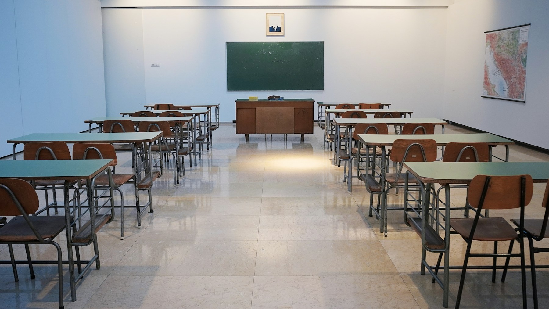 Bright modern classroom with student desks